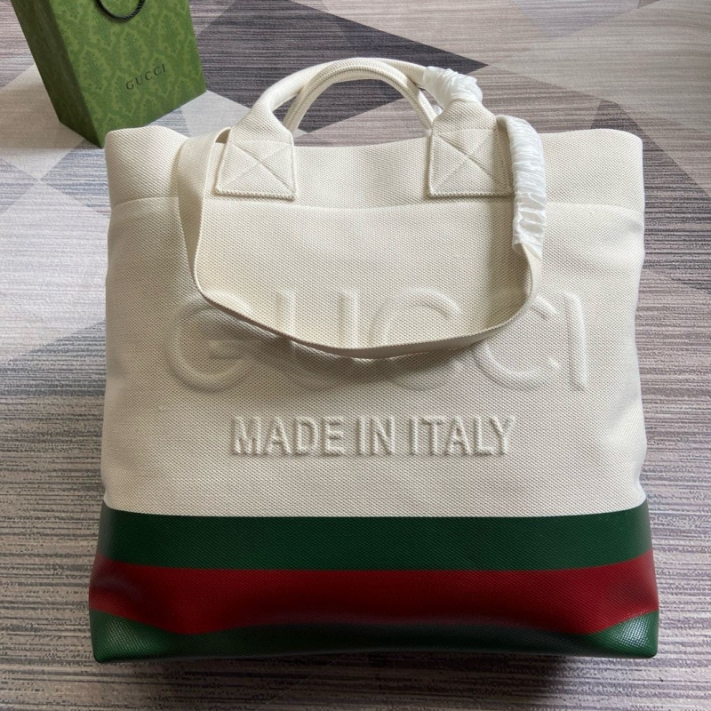 G*u*i shopping bags